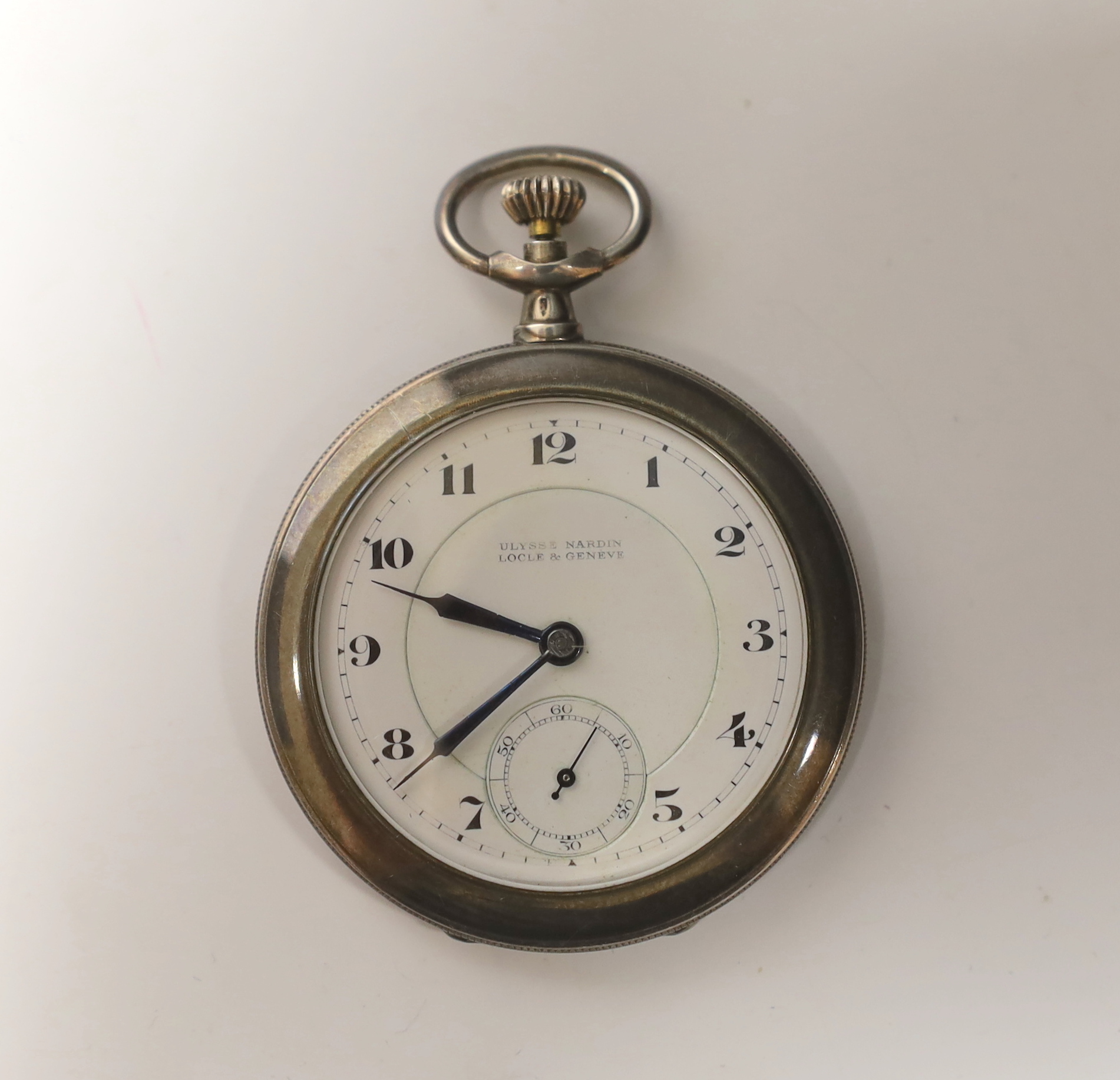 A Swiss 900 standard white metal cased Ulysse Nardin keyless open face dress pocket watch, with Arabic dial and subsidiary seconds, cased diameter 45mm.